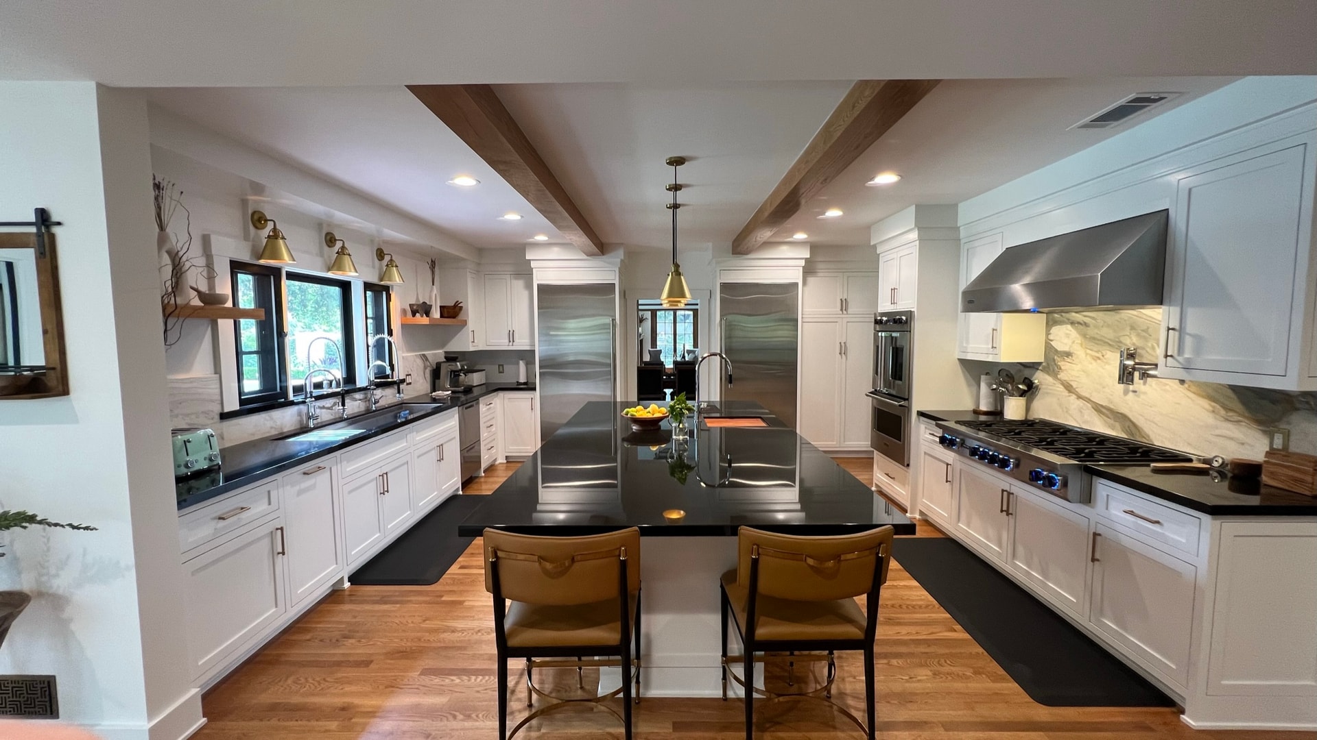Full kitchen remodel with white cabinetry and black island — South Pasadena