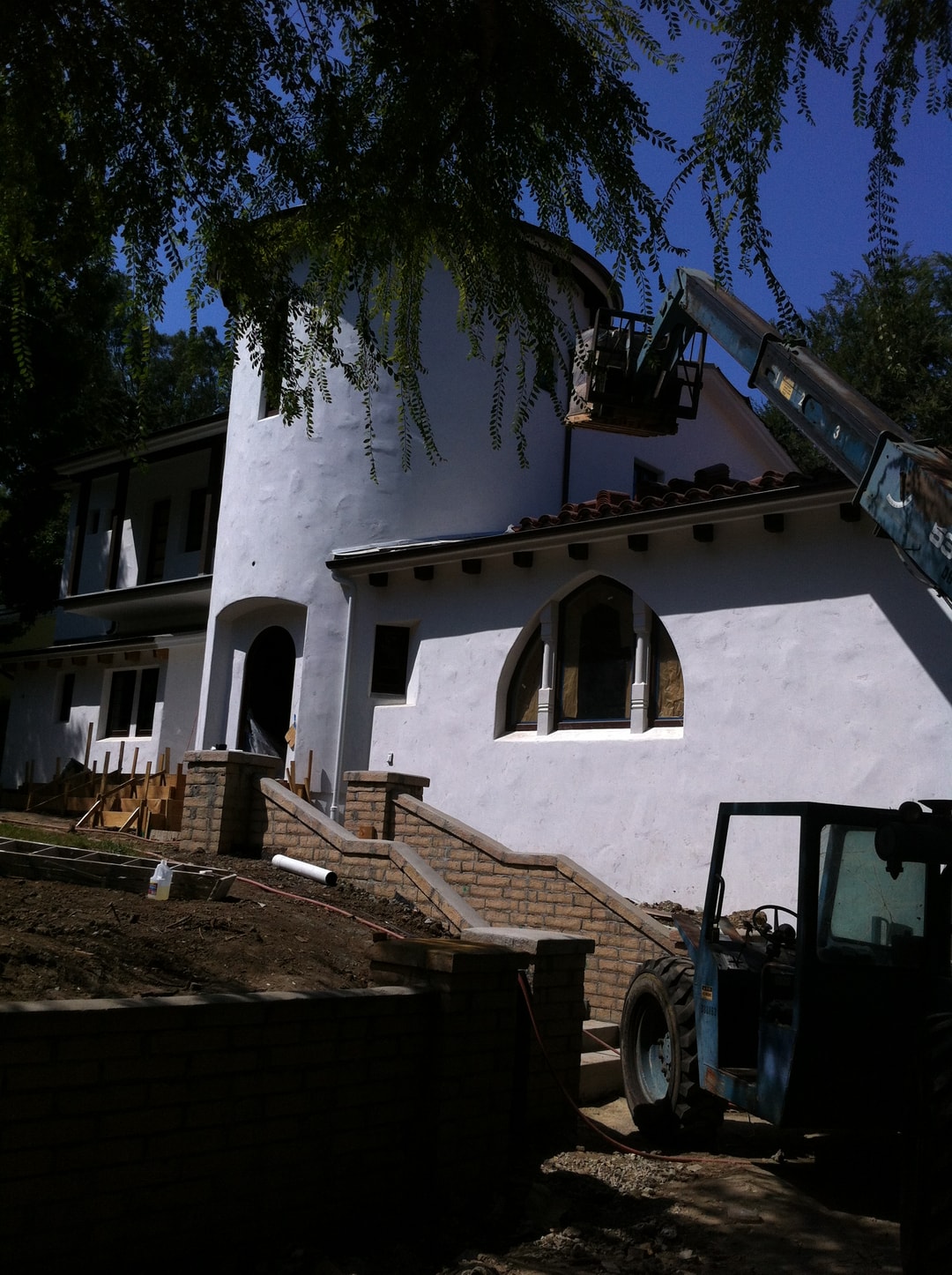 Spanish-style home exterior under construction — Studio City